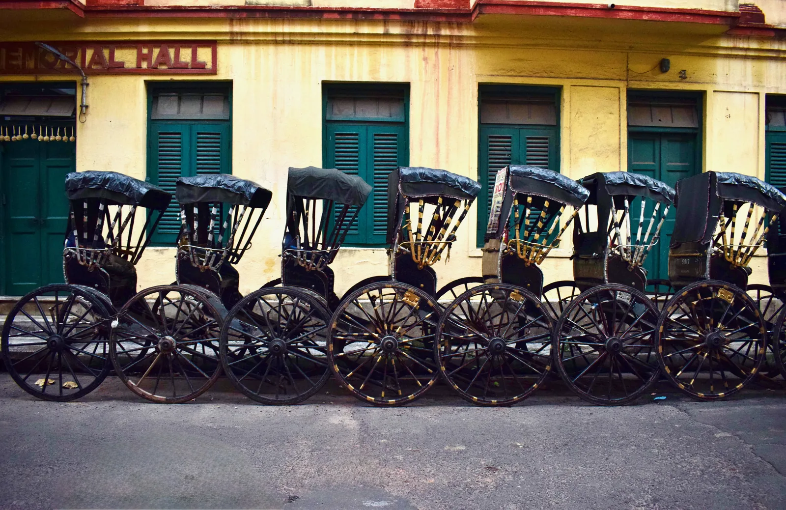 Hand-pulled rickshaws parked North Kolkata heritage tour