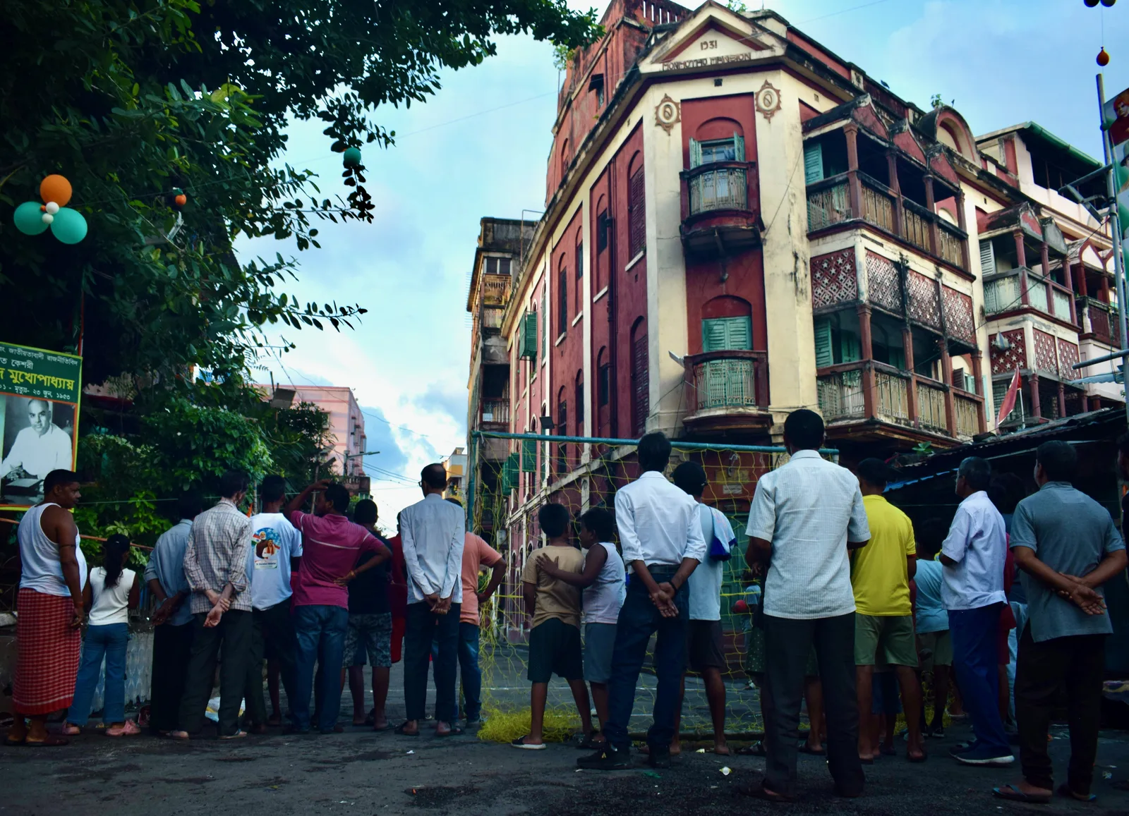 Crowd outside a 1931 heritage mansion, North Kolkata