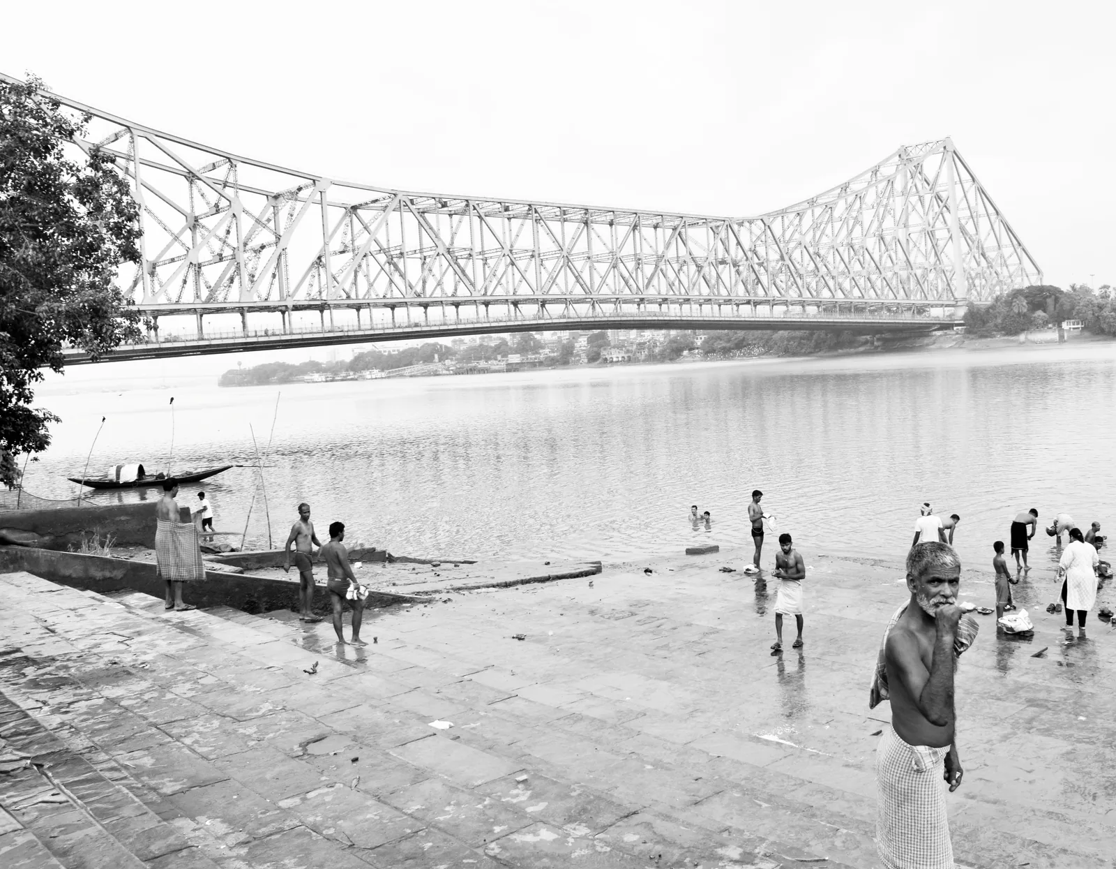 Morning rituals at Howrah Bridge ghat Kolkata