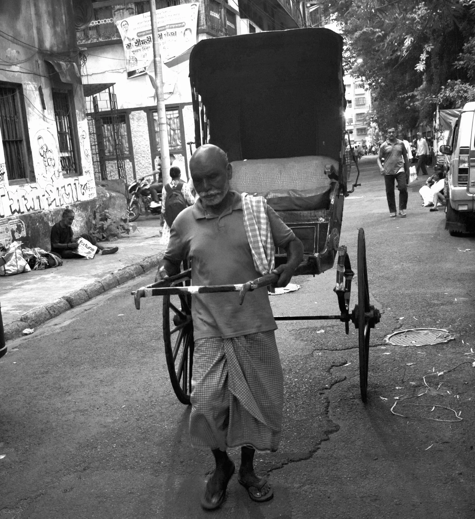 Rickshaw puller portrait North Kolkata street photography