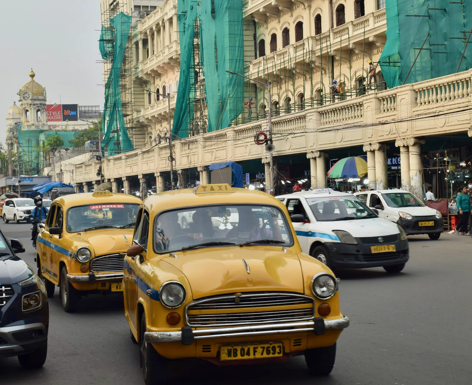 Yellow Ambassador taxis Dalhousie Square Kolkata city tour
